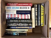 Box top view showing nine hardcovers and five paperbacks