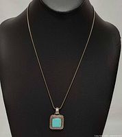 Full view of necklace displayed on bust