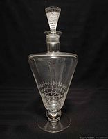 Full view of Lalique Treves decanter with stopper in place