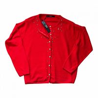 Front view of red cardigan showing bead embellishments and button closure