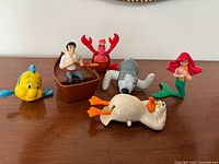 All six The Little Mermaid Happy Meal figures displayed together