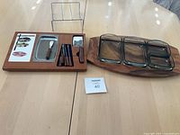 Overall view of both serving boards with accessories on table