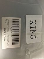 Label on package showing size King and product barcode