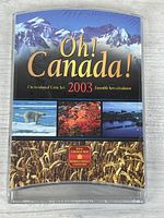 Front view of sealed 2003 Oh! Canada! coin set sleeve