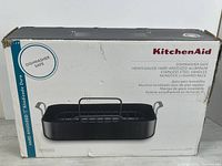 Front of retail box showing roasting pan and rack image