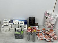 Group shot showing soaps, bath bombs, lint rollers, screen cleaners