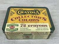 Front view of sealed Crayola Collector's Colors tin showing branding and 72 crayon count