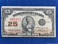 Obverse showing denomination, serial, signatures, date and wear