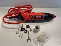 Rotary tool with cord and accessories spread out