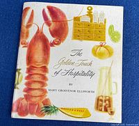 Front cover of booklet with illustrated lobster and bar items