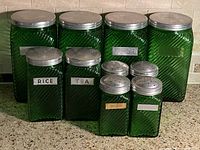 front view of full set showing size differences and lids