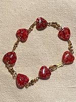 Full view of bracelet showing all heart beads and clasp