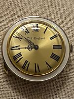 Front view of watch head showing dial, hands, bezel