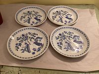 Four Figgjo Lotte bread plates front view