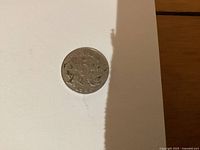 Reverse with large numeral 5, maple leaves and 1935 date