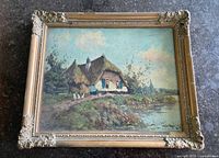 Framed landscape oil painting showing entire composition and frame