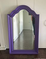 Front view showing full mirror and purple frame