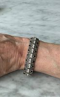 Bracelet worn on wrist showing overall design and fit
