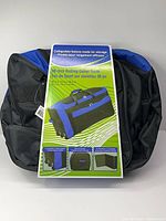 Front view of duffel with display insert showing product information