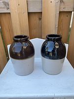 Pair of stoneware jars front view