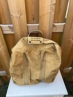 Front view of Irvin Air Chute canvas bag showing handles and overall condition