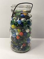 Full view of jar filled with marbles