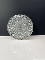 Front face showing concentric bubble pattern