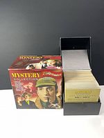 Outer box and open storage case showing disc sleeves