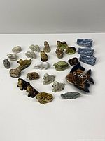 entire group of Wade figurines arranged on surface