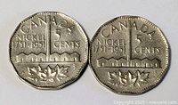 Front view of both 1951 5-cent coins showing commemorative reverse.