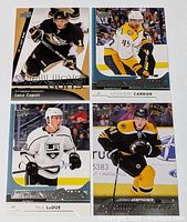 all four rookie cards arranged 2x2