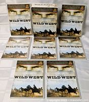 Front view showing eight DVD cases and artwork