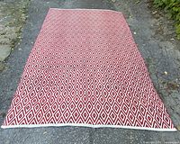 Full view of rug laid flat showing overall size and pattern