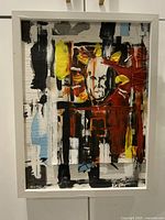 Framed vertical abstract painting front view