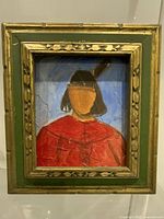 Front view of framed impasto portrait