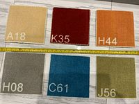 Six carpet trivets laid out with tape measure for scale