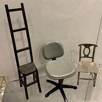 All three miniature chairs grouped, showing scale and design details