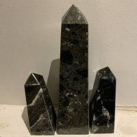 Three obelisks grouped showing size variance