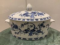 Front view of tureen with lid showing pattern and handles