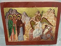 Front view of wood icon showing full painted scene and gold leaf background