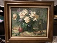 Framed painting showing subject and frame