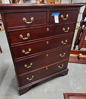 Full front view of 6-drawer dresser showing overall design and hardware