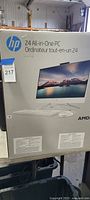 Front of boxed HP 24 all-in-one PC showing product image and branding