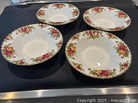 Four Old Country Roses soup bowls displayed top view