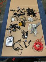 Overall view of all assorted cords laid out on table