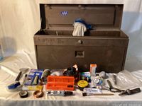 Front view of toolbox closed with contents displayed