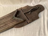 Drying rack folded with brass hinge detail visible