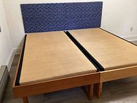 Tatami mats on wood frames with headboard attached