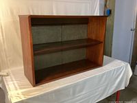 Front view showing entire bookcase with two shelves