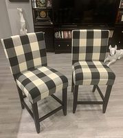 Two plaid parsons counter stools front view